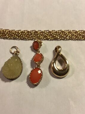 Interchangeable pendants (3) with gold tone chain